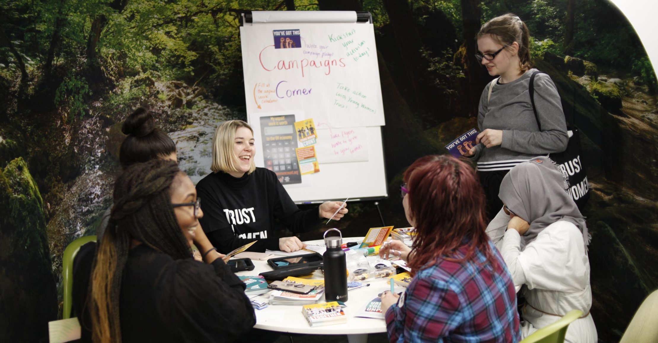 Young women working together at a table