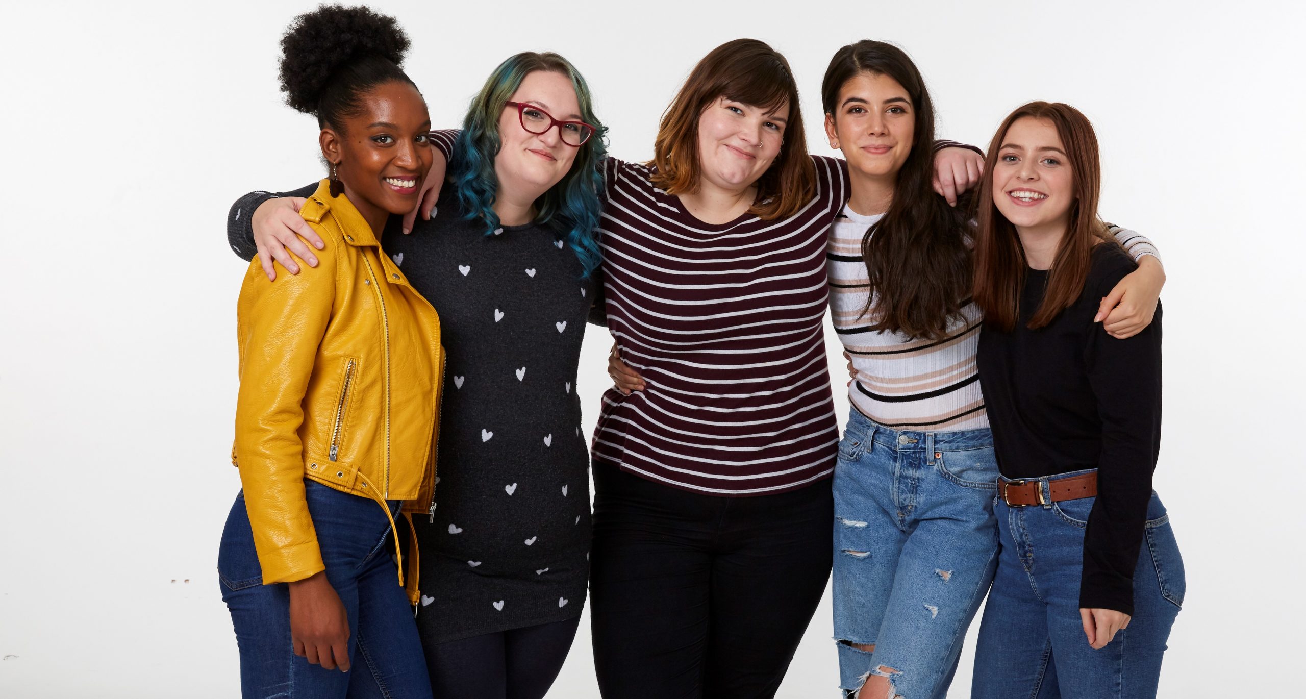 A group of women with arms linked