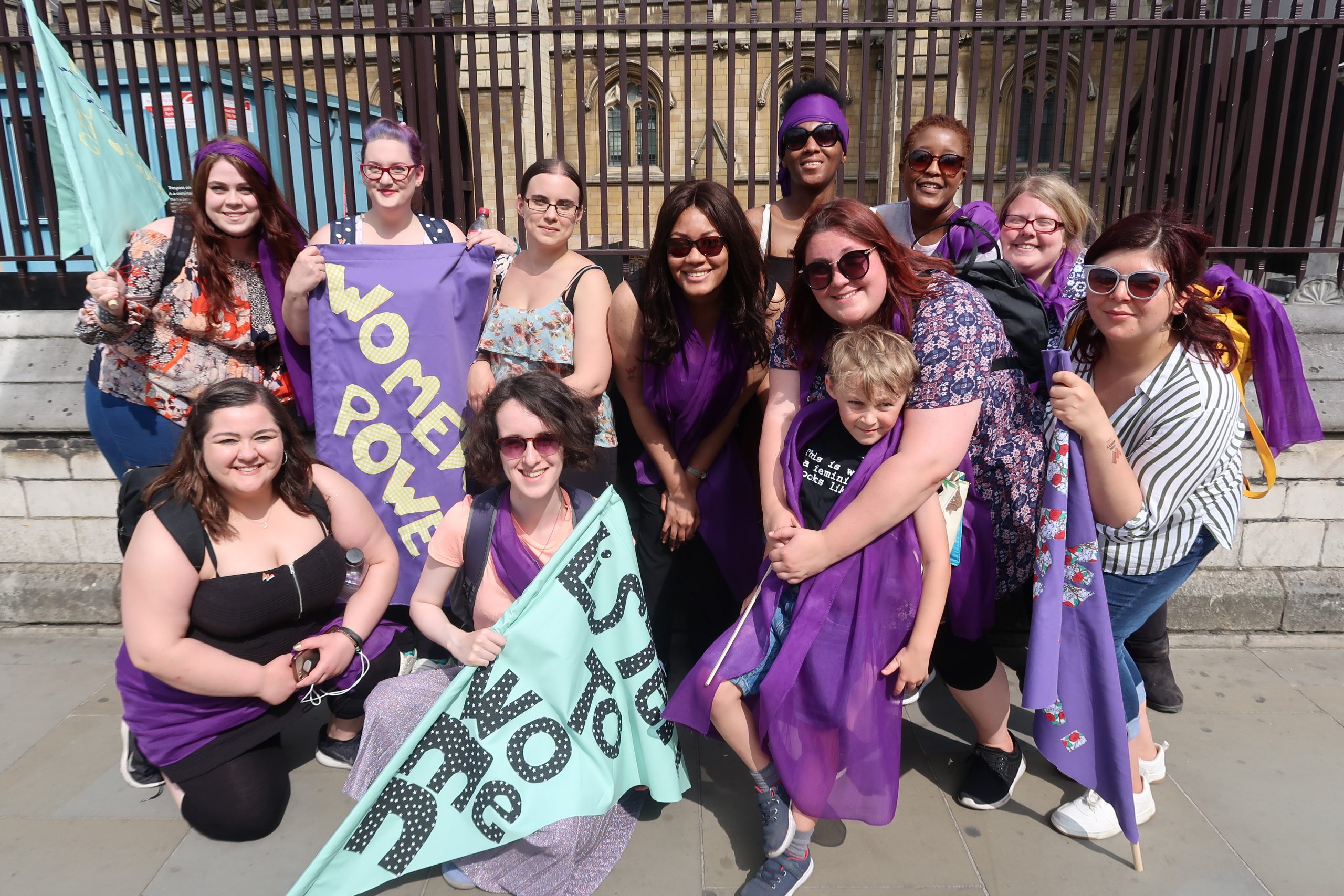 Young women with campaign banners