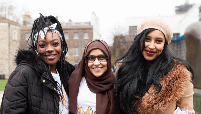 Young women smiling in a group