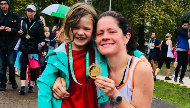 Mother and daughter at a fundraising running event