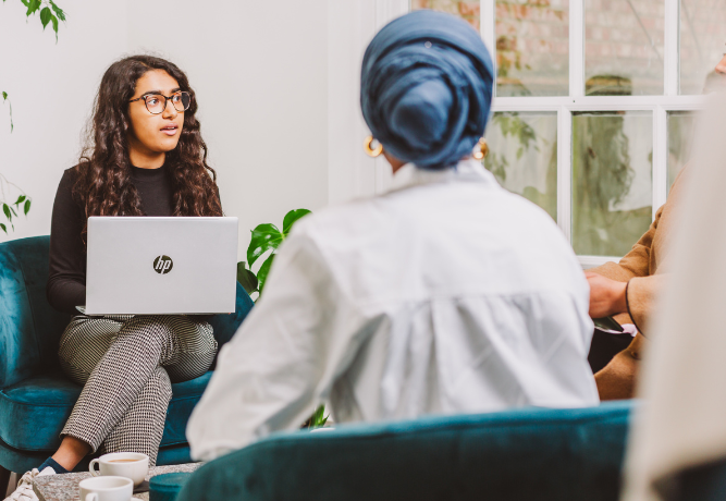 two young women in conversation